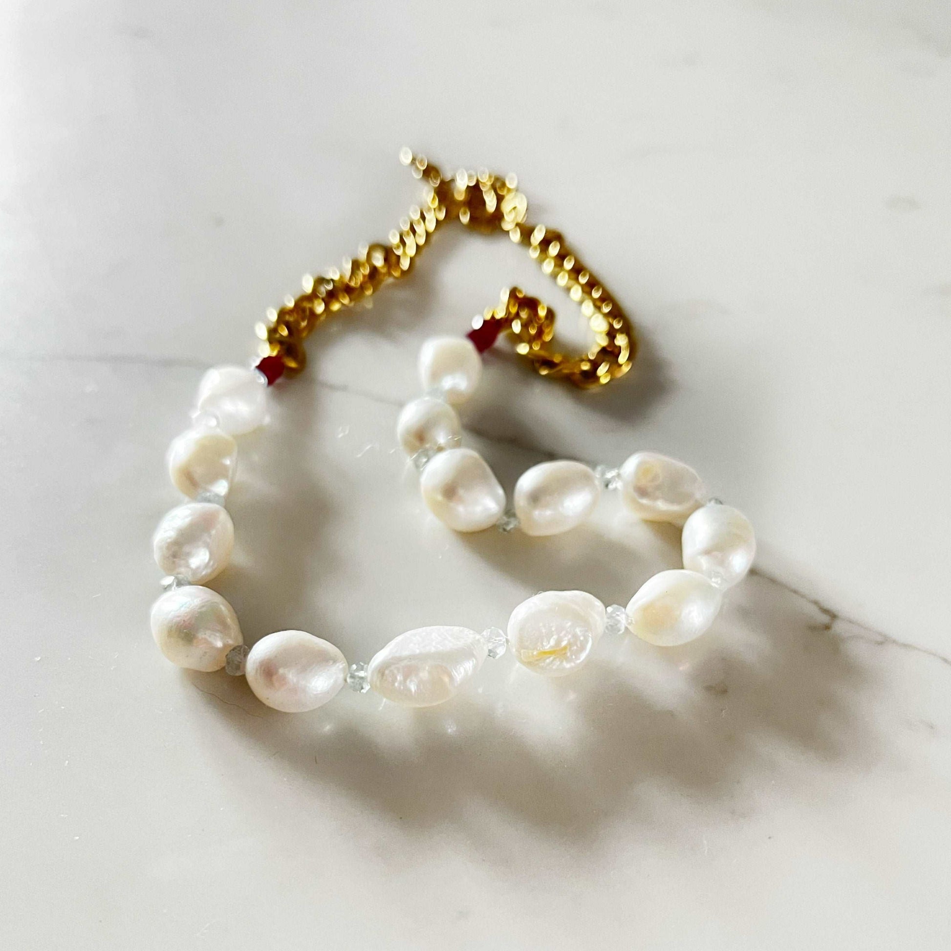 Flora white baroque pearl necklace with aquamarine and garnet beads