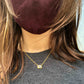 Alex wearing Maia Necklace with Labradorite stone